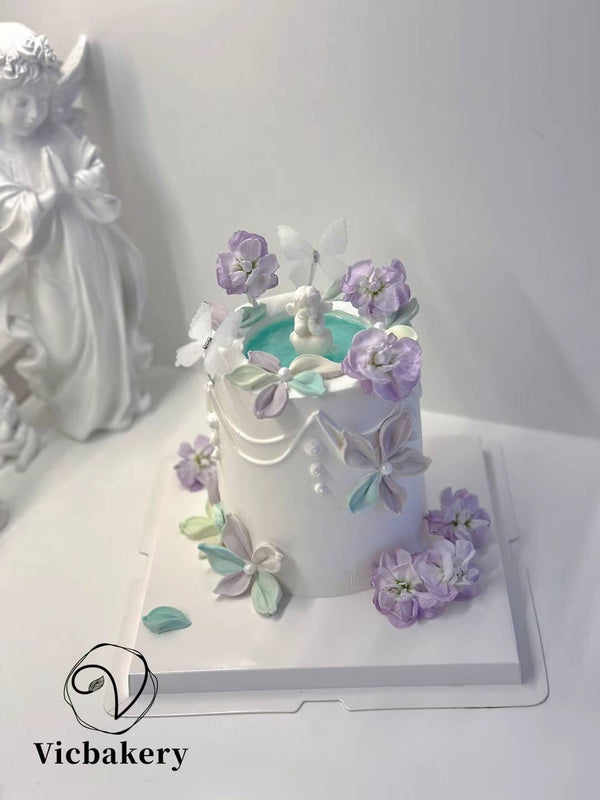 Knife painting with fresh flower fountain cake