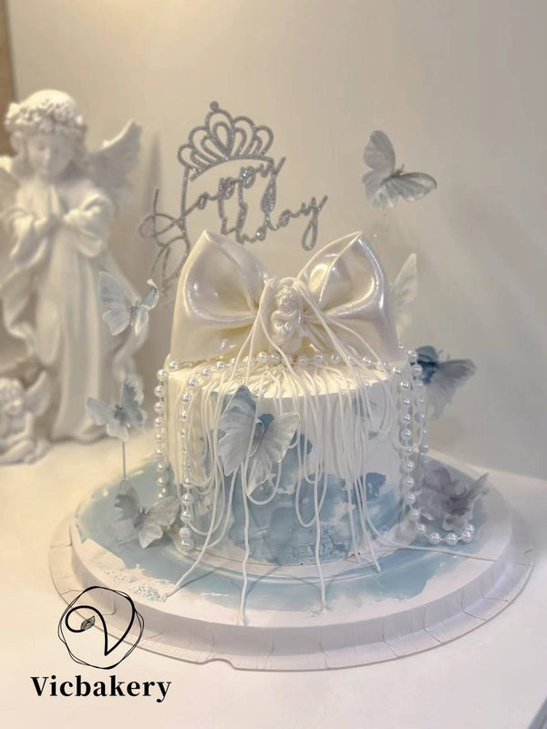 Fondant ribbon blue butterfly cake