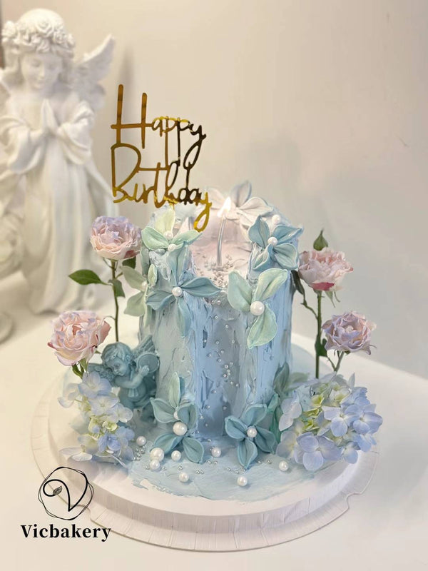 Candle knife painting cake with fresh flower