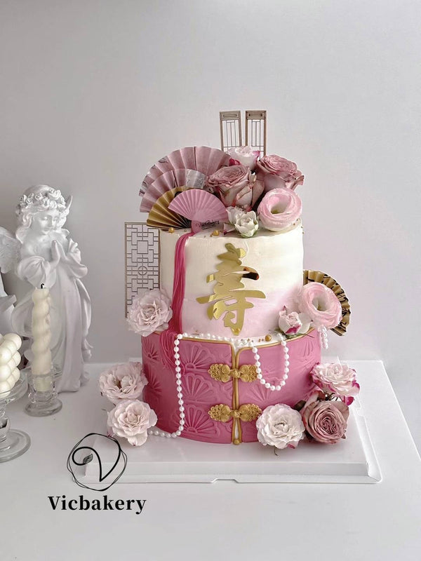 Longevity Pink themed cake with fresh flowers