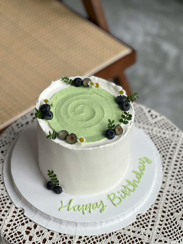 Men's Cake-white cake with blueberries and green top