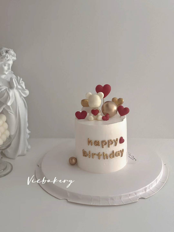 White cake with Bear and hearts