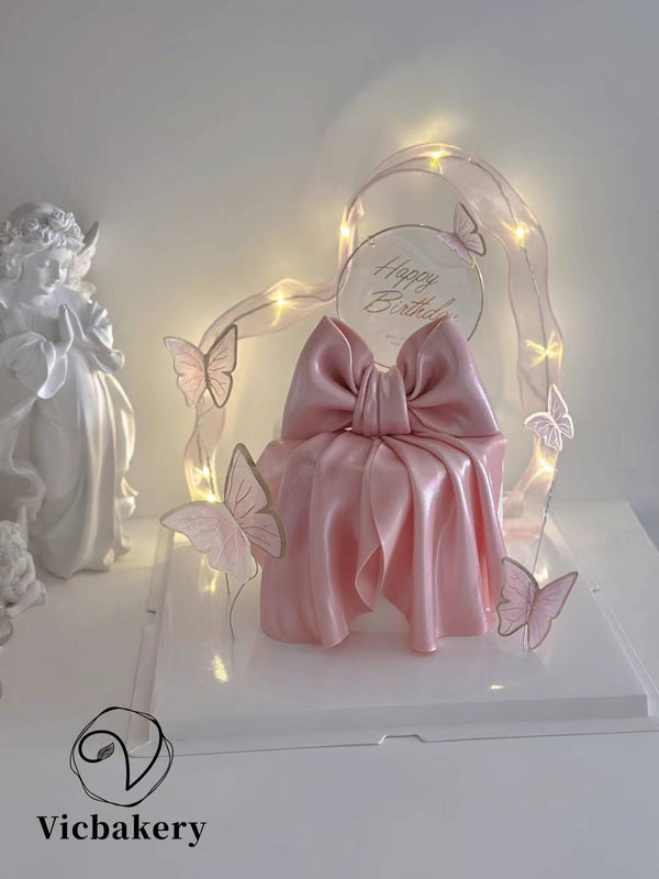 Pink glitter fairy light cake